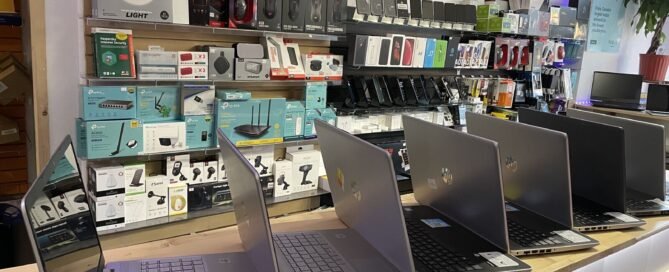 Laptops on the counter at Tech Gate Computers, a laptop repair shop near the University of Windsor